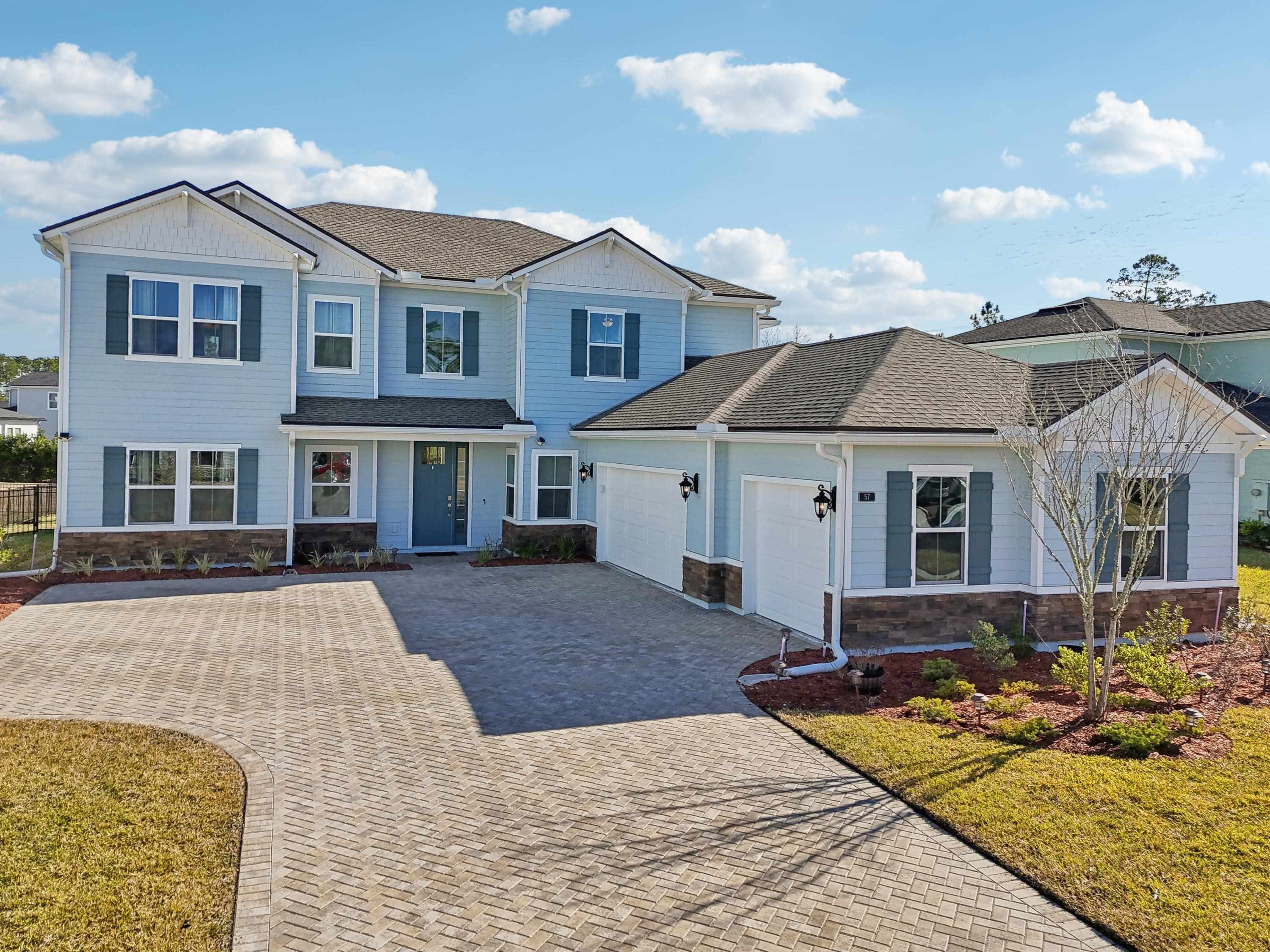 57 Sunset Ridge Court St. Johns, FL 32259 - Photo 62 of 79 a front view of a house with a yard