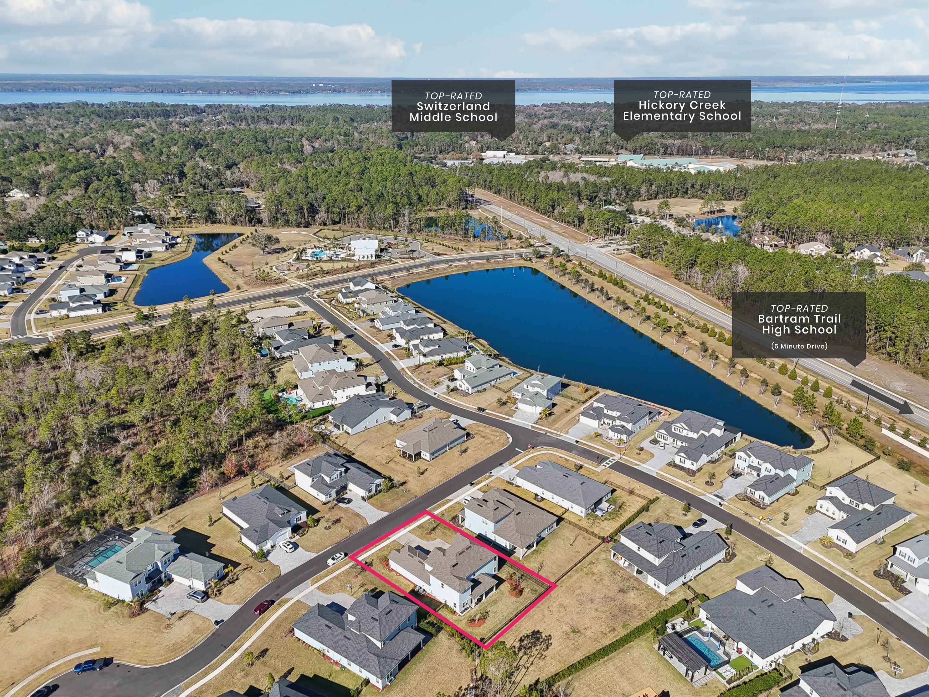 57 Sunset Ridge Court St. Johns, FL 32259 - Photo 72 of 79 Aerial perspective of suburban area with a large body of water and property parcel outlined