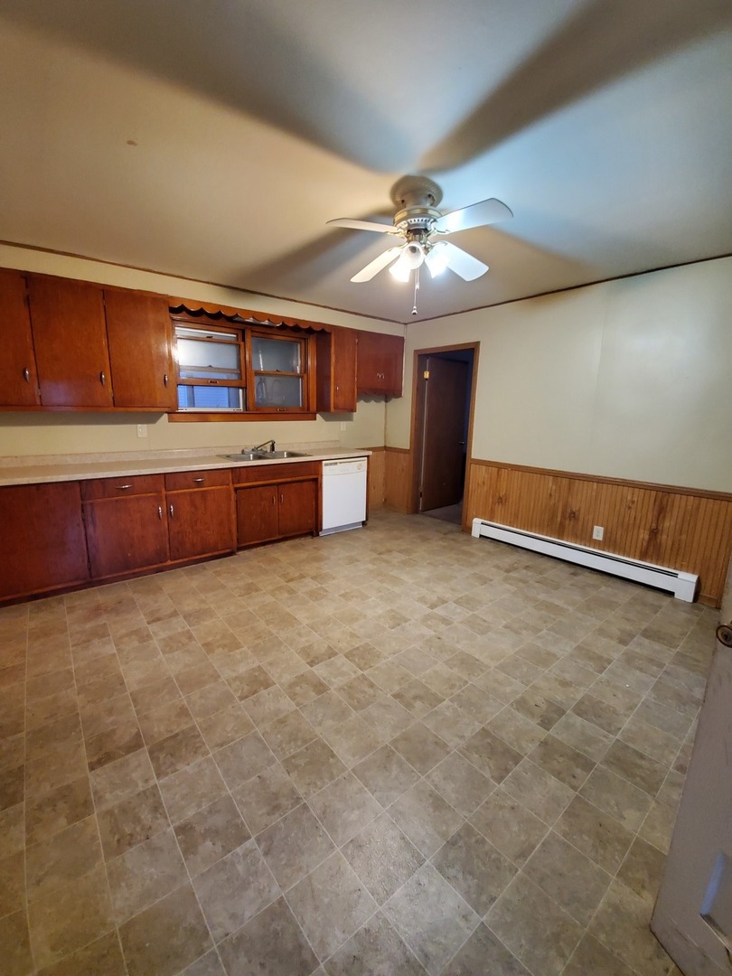 461 West Cermak Road Braidwood, IL 60408 - Photo 4 of 15 a view of an empty room with kitchen