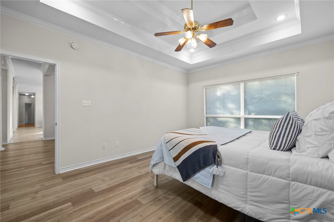 707 Livingston Court Temple, TX 76502 - Photo 20 of 36 a bedroom with a bed and a large window