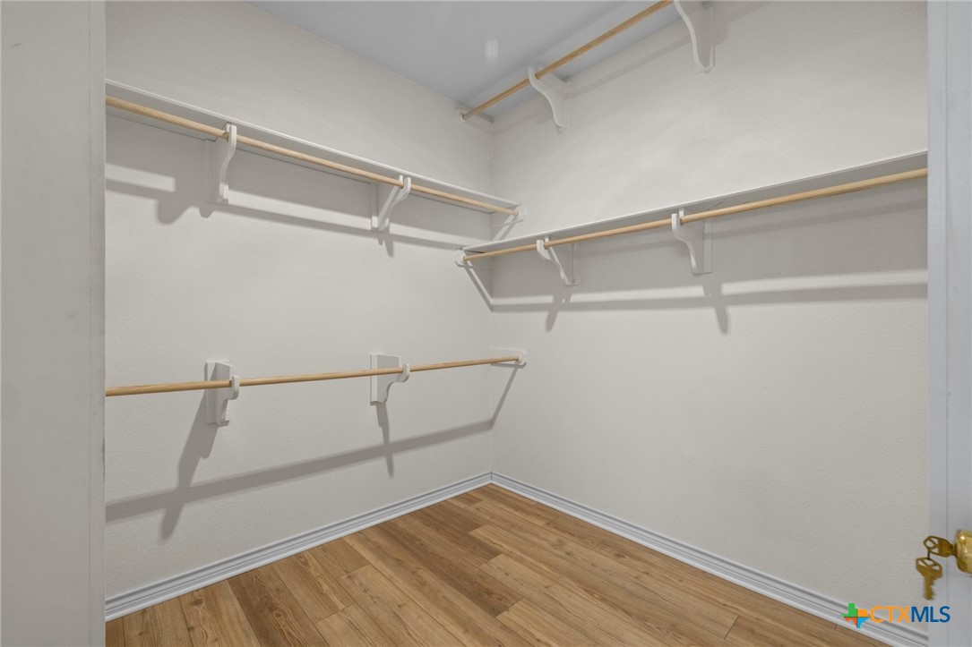 707 Livingston Court Temple, TX 76502 - Photo 24 of 36 a view of an empty walk in closet