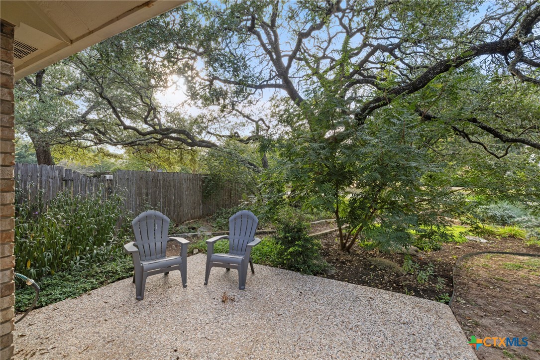 707 Livingston Court Temple, TX 76502 - Photo 32 of 36 a view of a two chairs in a backyard