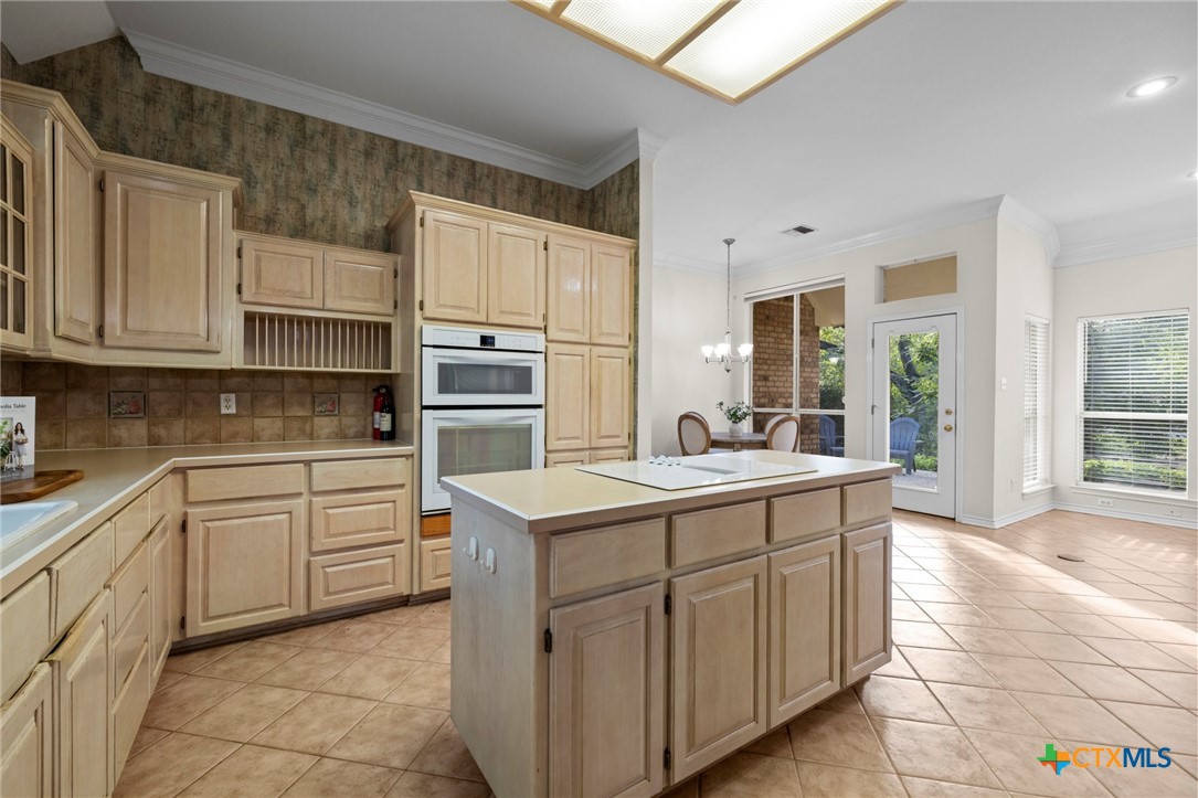 707 Livingston Court Temple, TX 76502 - Photo 9 of 36 a kitchen with cabinets appliances and a sink