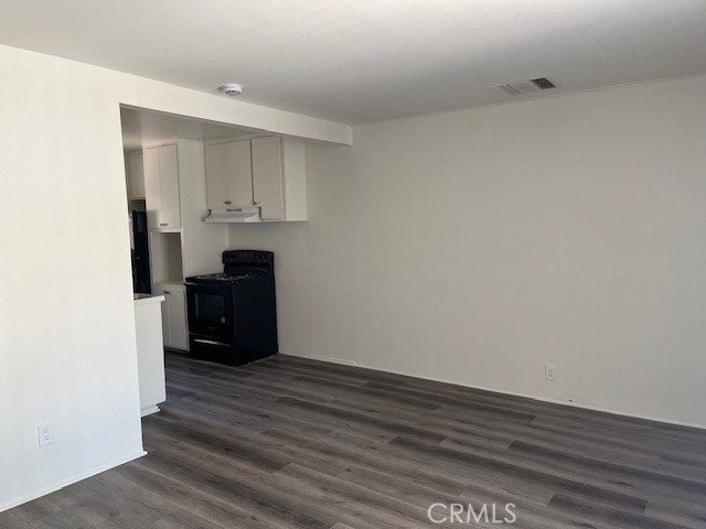 73740 Santa Rosa Way, Unit 5 Palm Desert, CA 92260 - Photo 8 of 20 a view of an empty room with a kitchen