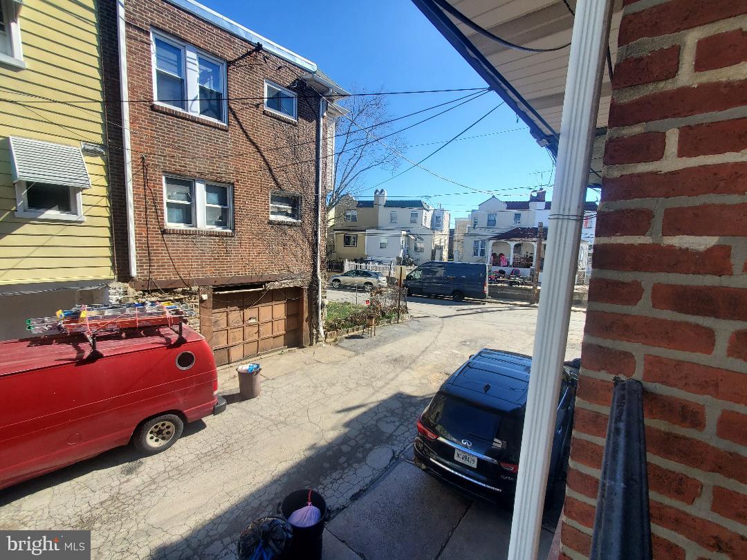 207 Avon Road Upper Darby, PA 19082 - Photo 14 of 29 a car parked in front of a building