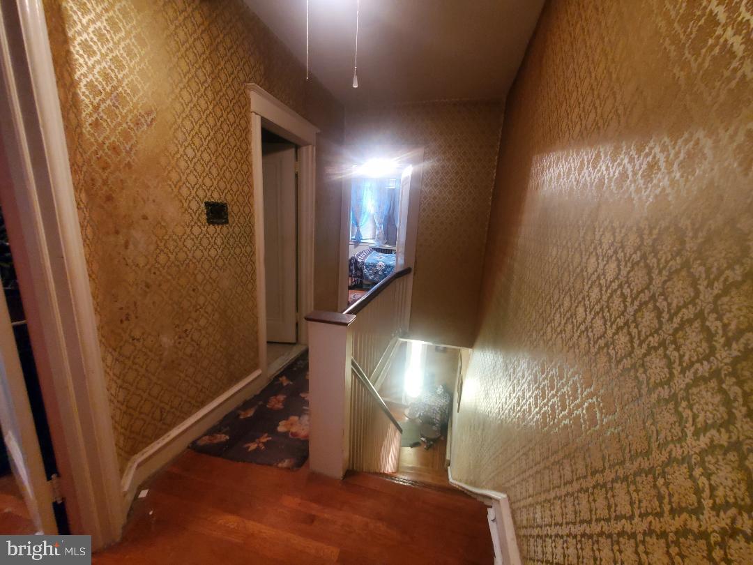 207 Avon Road Upper Darby, PA 19082 - Photo 15 of 29 a view of a livingroom with stairs