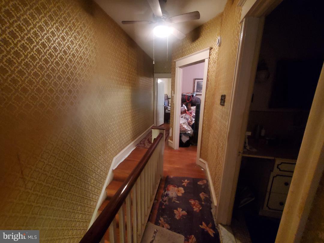 207 Avon Road Upper Darby, PA 19082 - Photo 16 of 29 a view of hallway with a couch