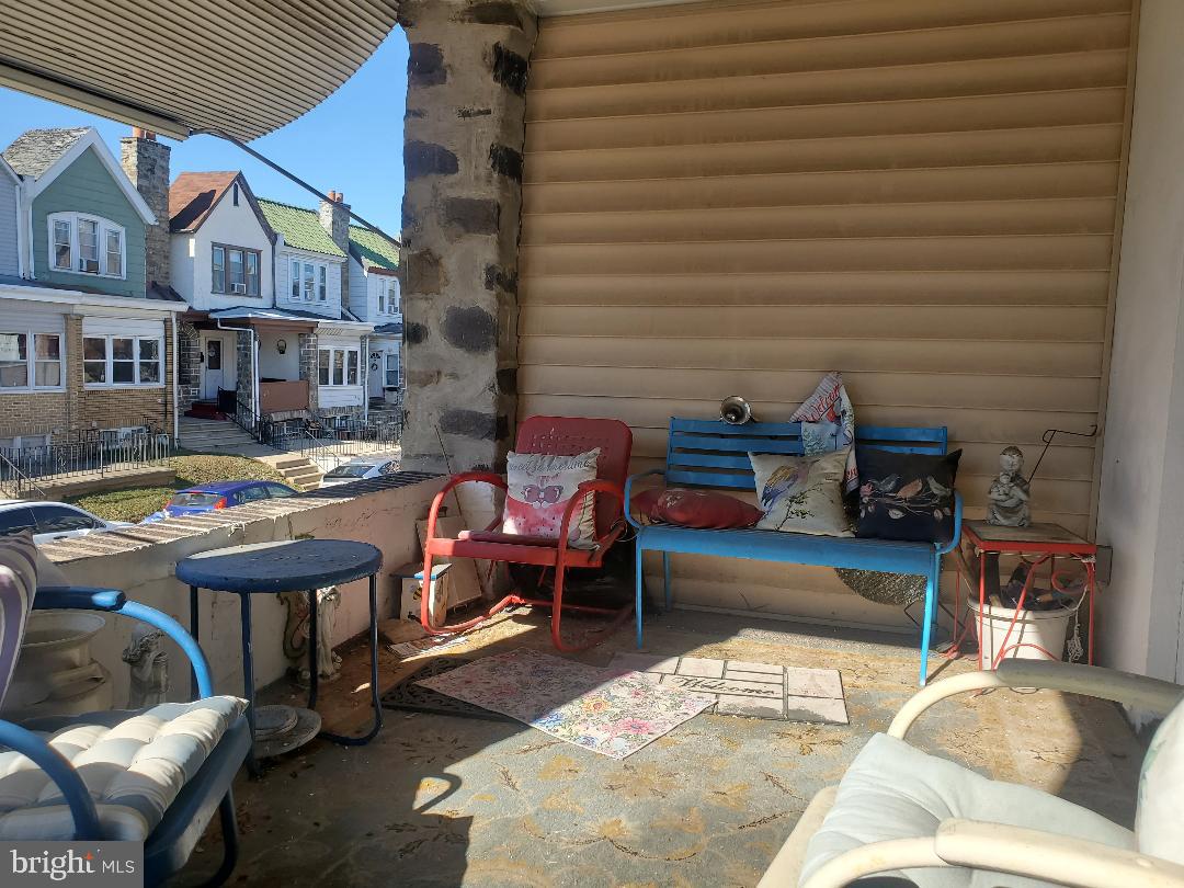 207 Avon Road Upper Darby, PA 19082 - Photo 6 of 29 a living room filled with furniture