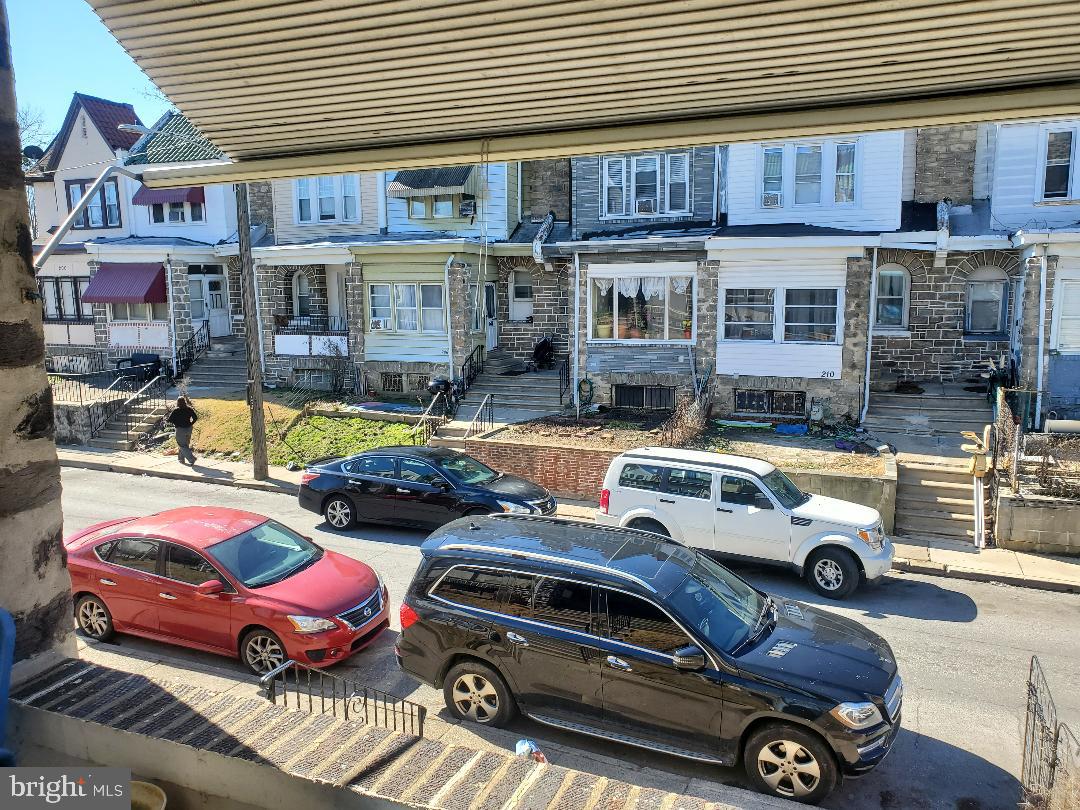 207 Avon Road Upper Darby, PA 19082 - Photo 7 of 29 a front view of a house with parking space