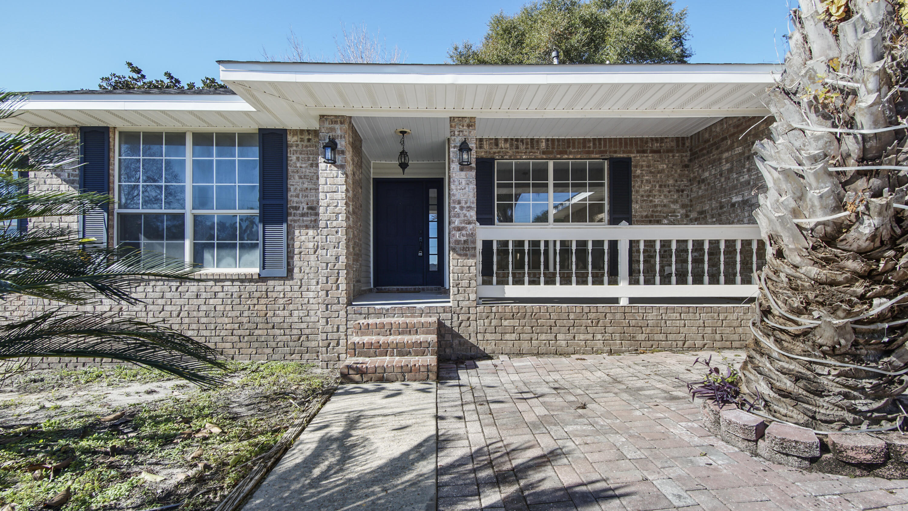 5200 Whitehurst Lane Crestview, FL 32536 - Photo 12 of 49 a front view of a house with a porch