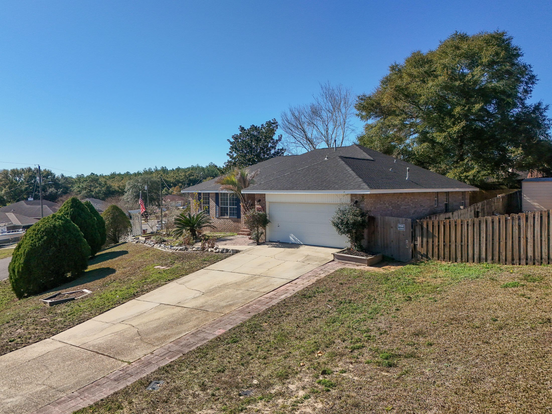 5200 Whitehurst Lane Crestview, FL 32536 - Photo 2 of 49 a view of a house with backyard and sitting area