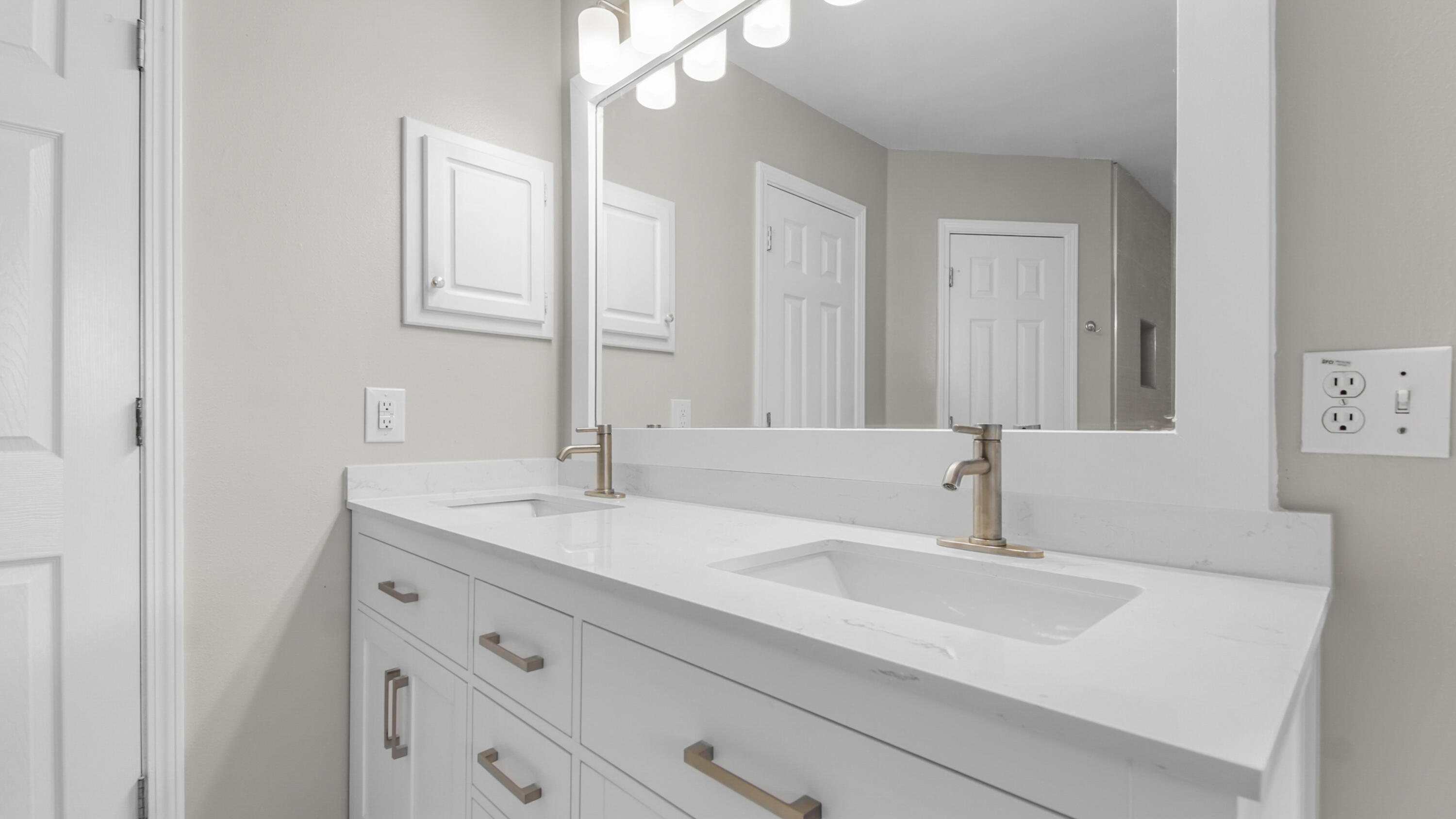 5200 Whitehurst Lane Crestview, FL 32536 - Photo 46 of 49 a bathroom with a sink and a mirror