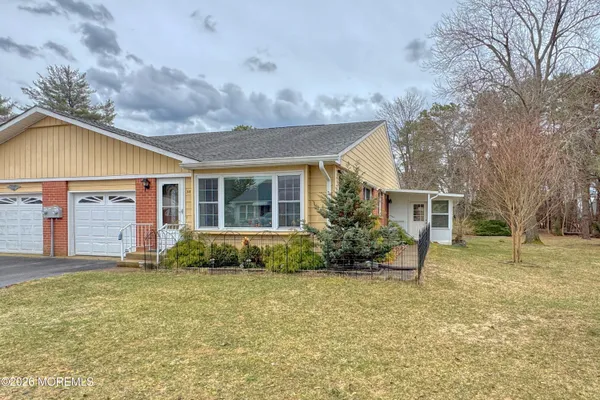 a view of a house with a garden
