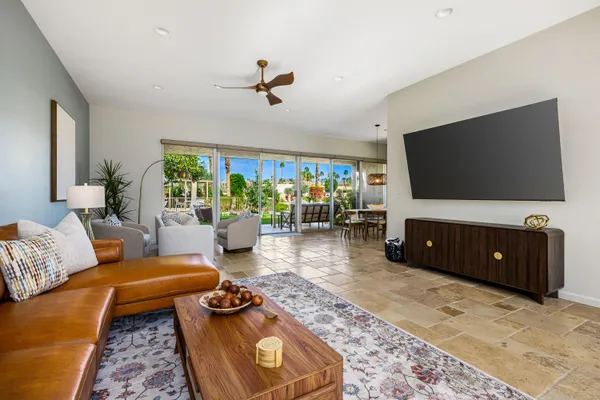 a en suite bathroom with a sink double vanity and a mirror