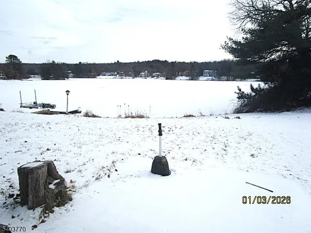 a front view of a building with a garden