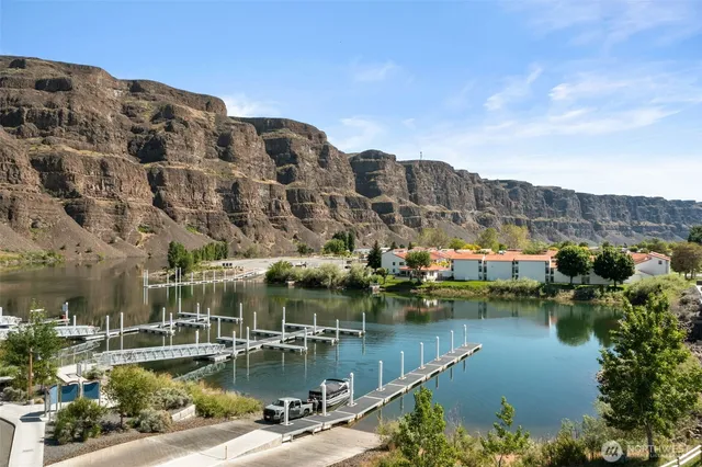 a house view with swimming pool and outdoor space