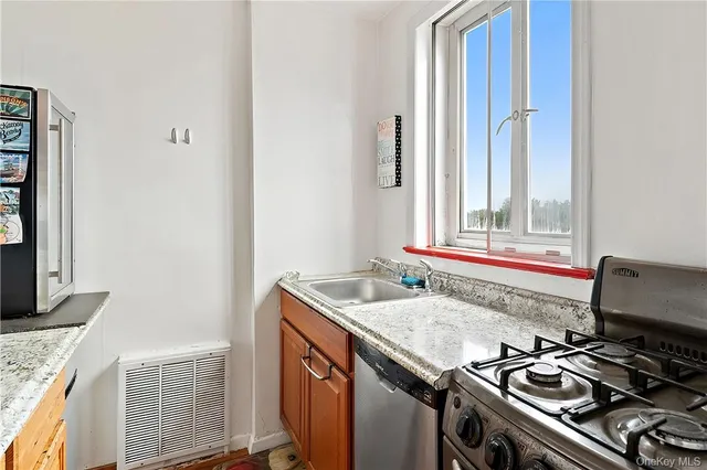 a kitchen with a stove and a microwave