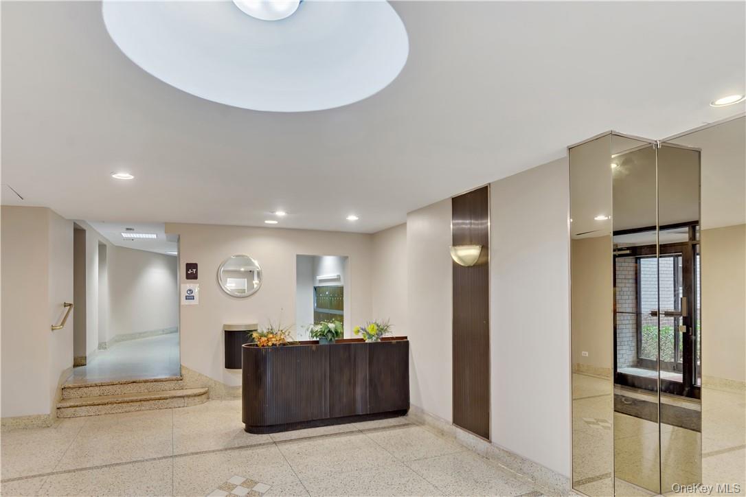 4320 Van Cortlandt Park East, Unit 6B Bronx, NY 10470 - Photo 2 of 19 a view of kitchen with stainless steel appliances kitchen island granite countertop a refrigerator and a stove top oven