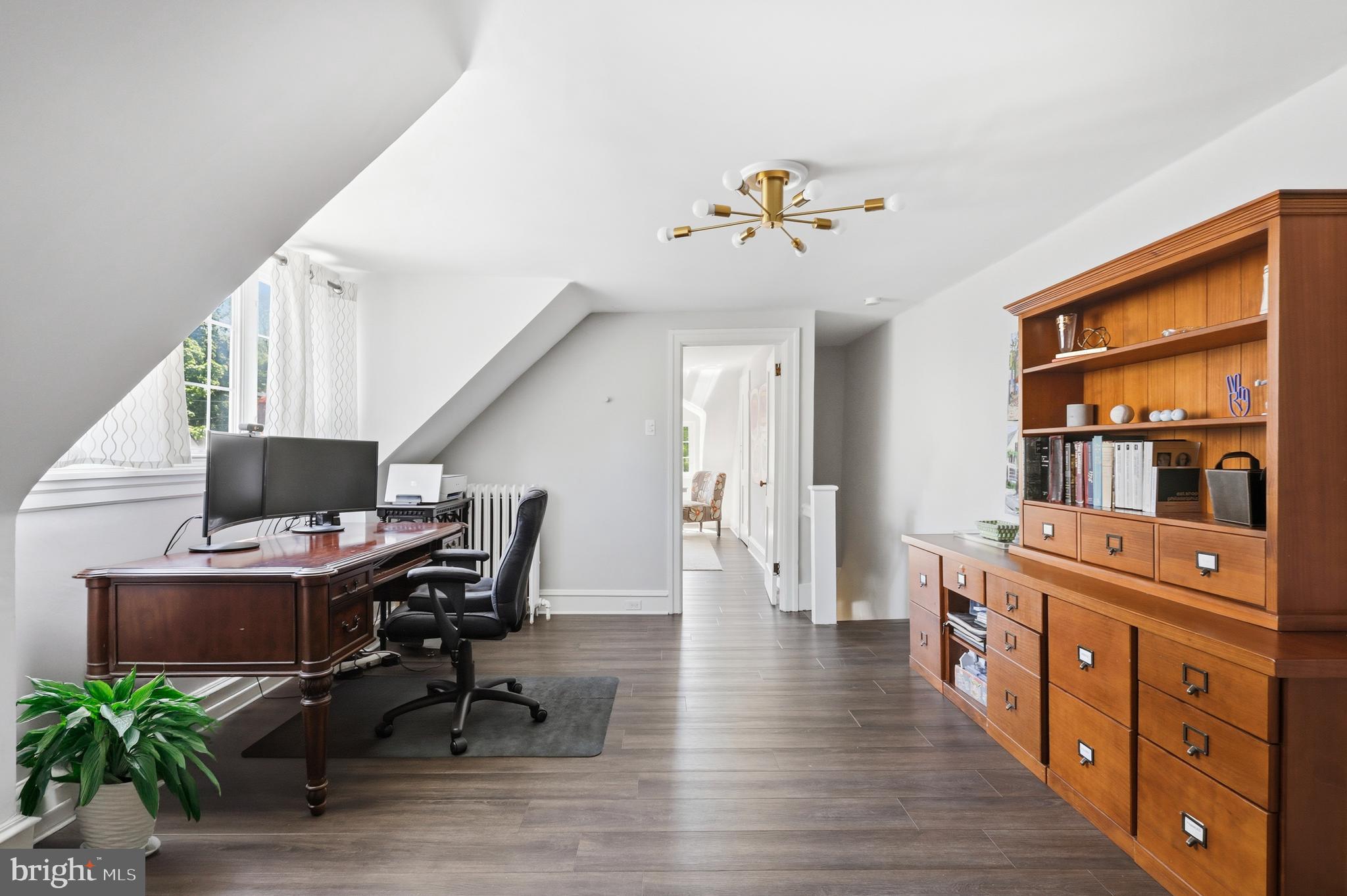 307 East Gravers Lane Philadelphia, PA 19118 - Photo 31 of 44 a view of a workspace with furniture and a window