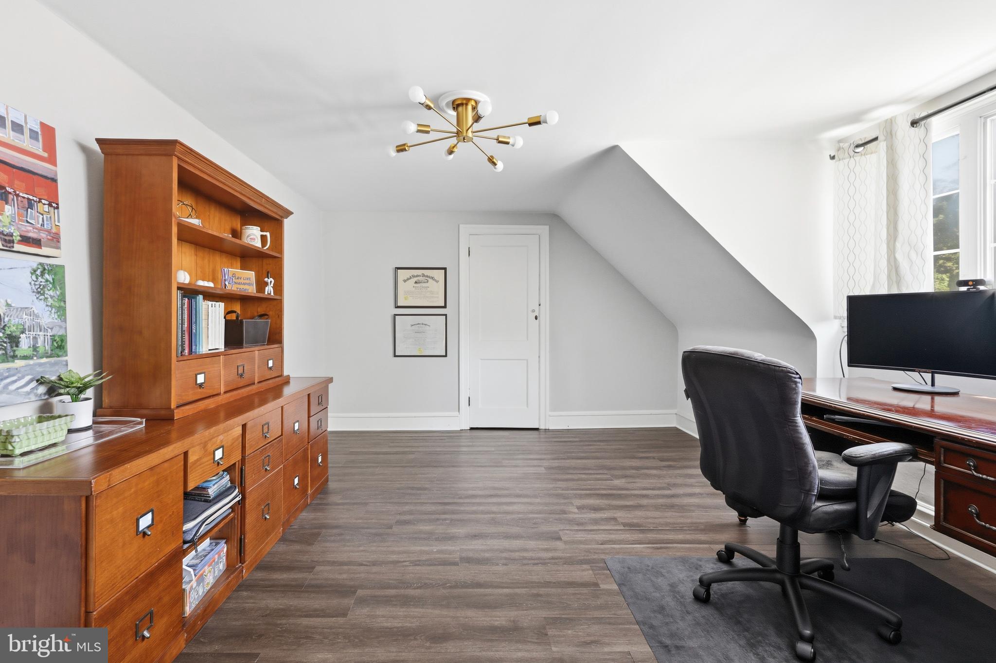 307 East Gravers Lane Philadelphia, PA 19118 - Photo 32 of 44 a view of a livingroom with workspace and a window
