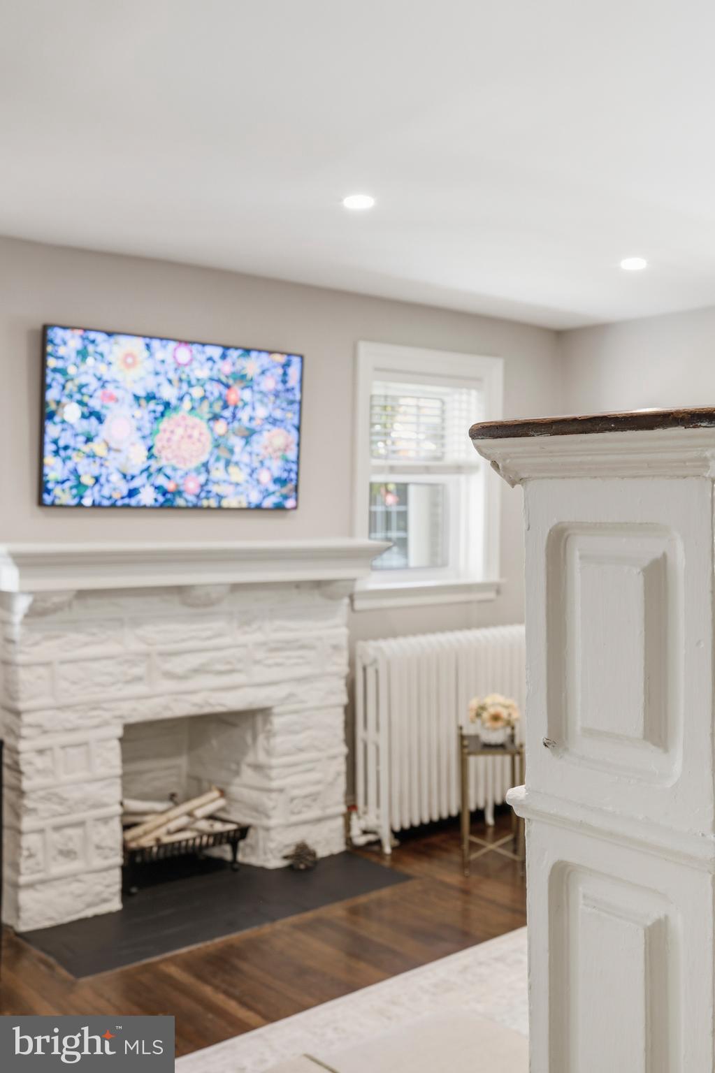 307 East Gravers Lane Philadelphia, PA 19118 - Photo 36 of 44 a living room with furniture and a fireplace