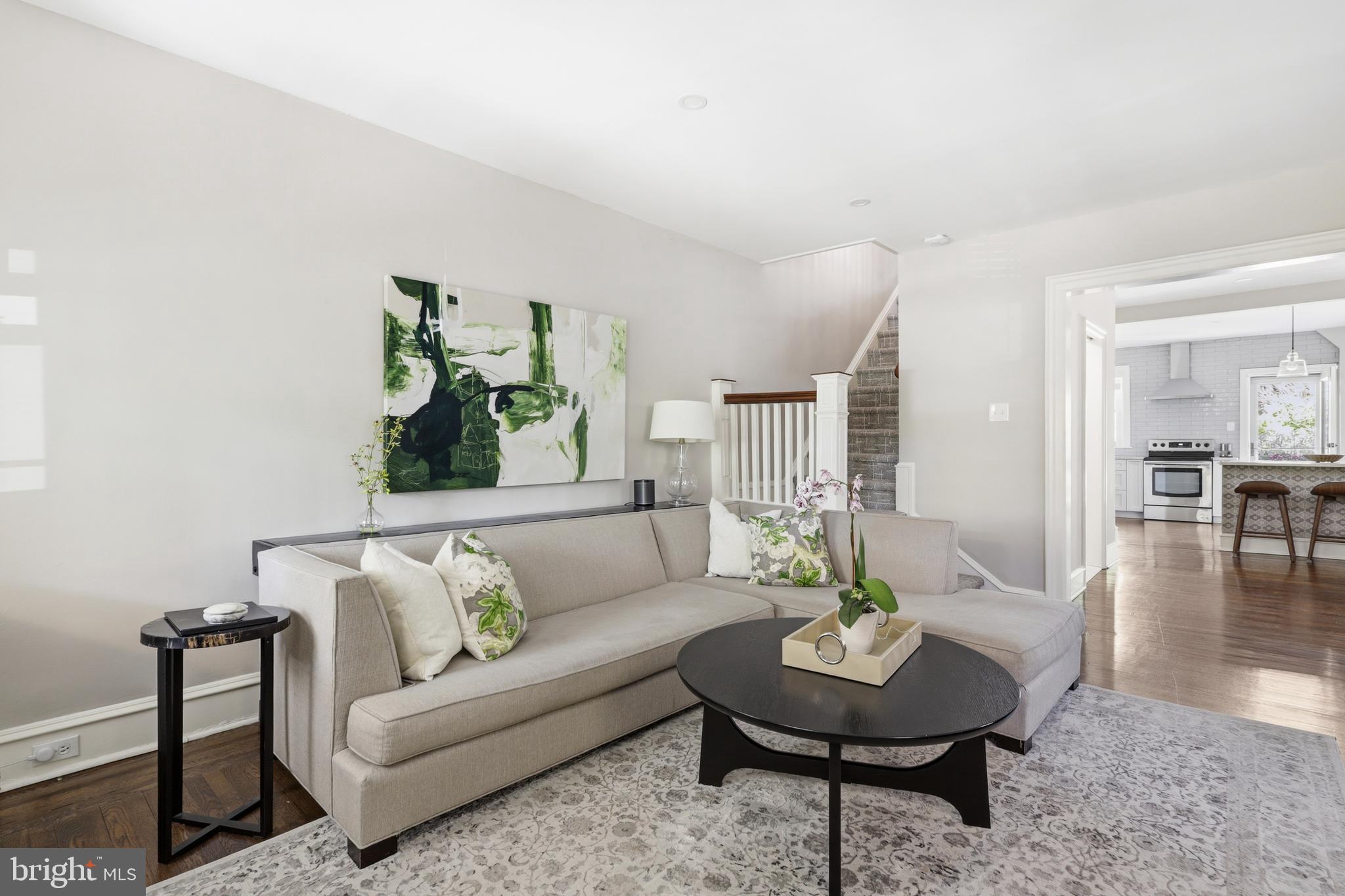 307 East Gravers Lane Philadelphia, PA 19118 - Photo 4 of 44 a living room with furniture and a table and chairs