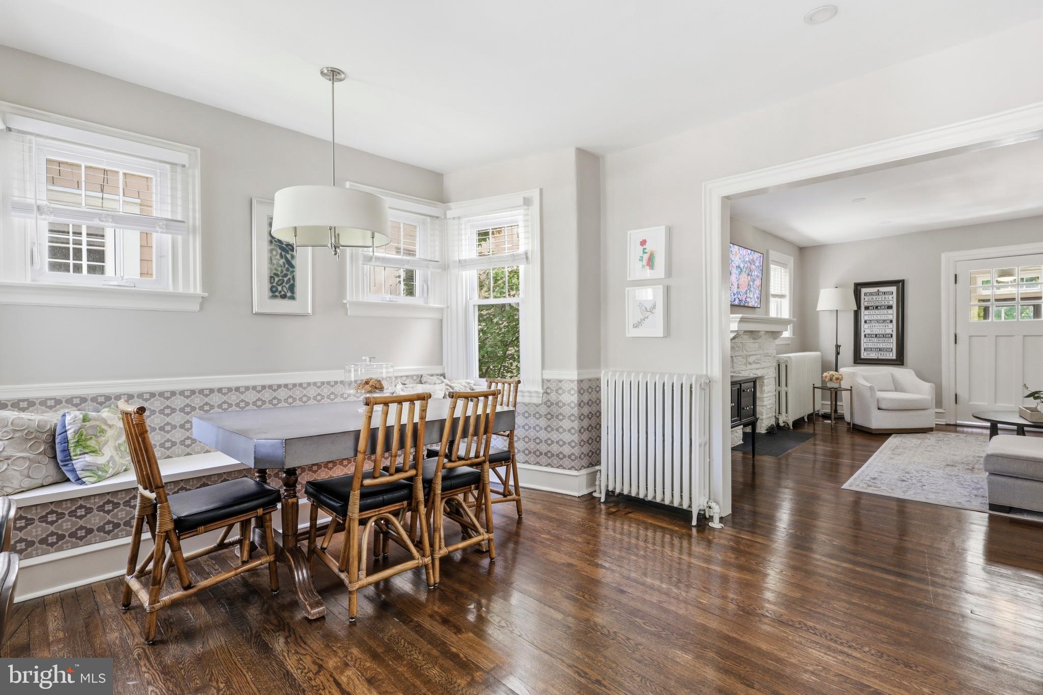 307 East Gravers Lane Philadelphia, PA 19118 - Photo 6 of 44 a view of a dining room with furniture wooden floor and chandelier