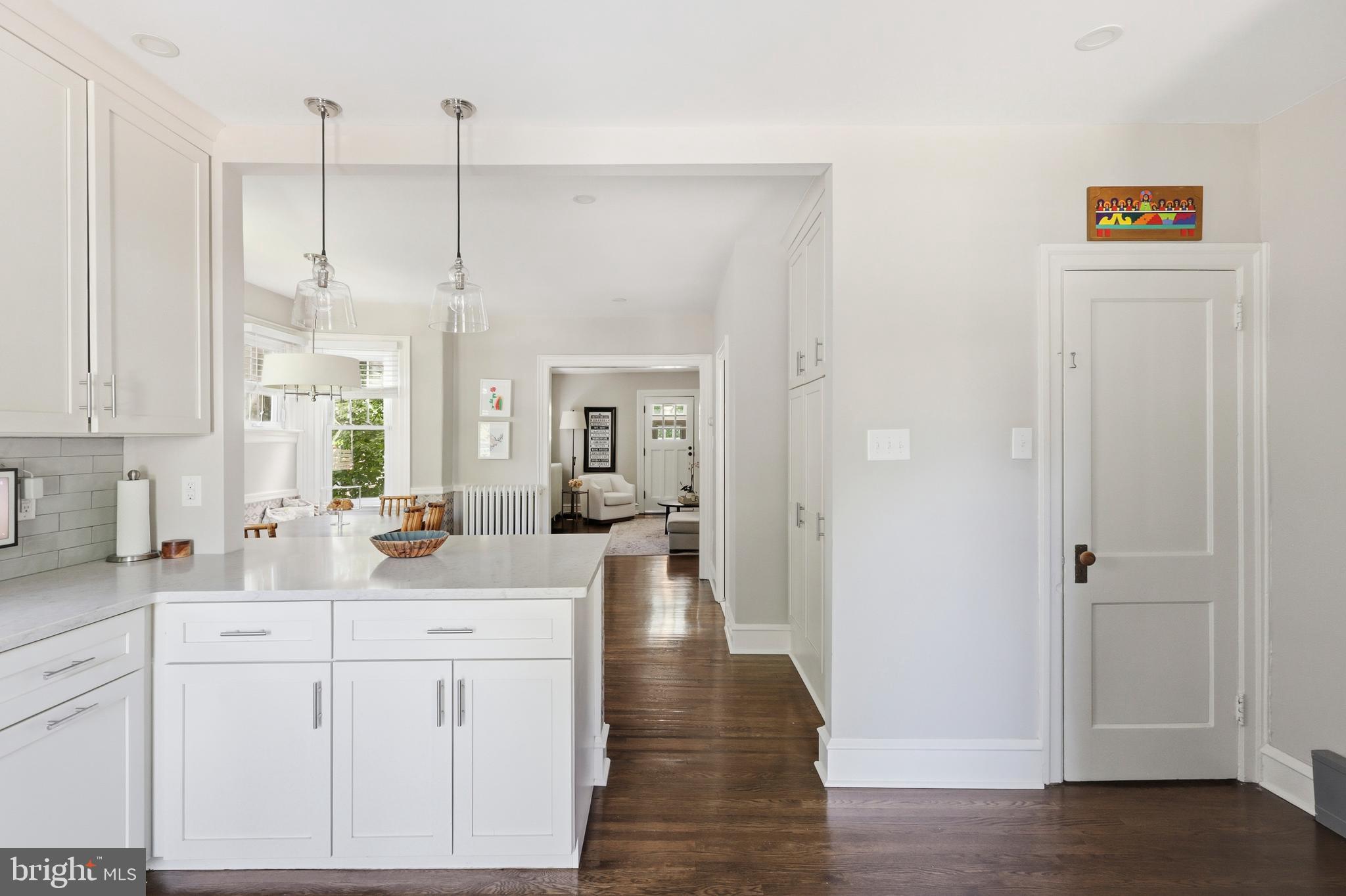 307 East Gravers Lane Philadelphia, PA 19118 - Photo 7 of 44 a view of a kitchen counter space with wooden floor