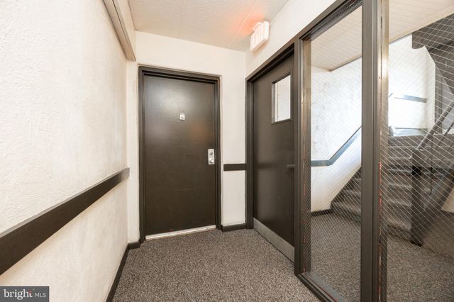 a kitchen with stainless steel appliances granite countertop a stove and a refrigerator