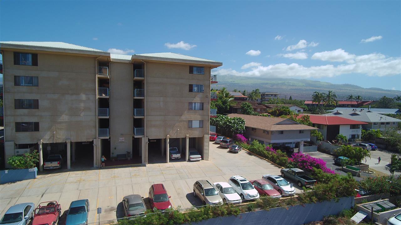 82 Kanani Road Kihei, HI 96753 - Photo 12 of 20 a front view of a building with an outdoor space