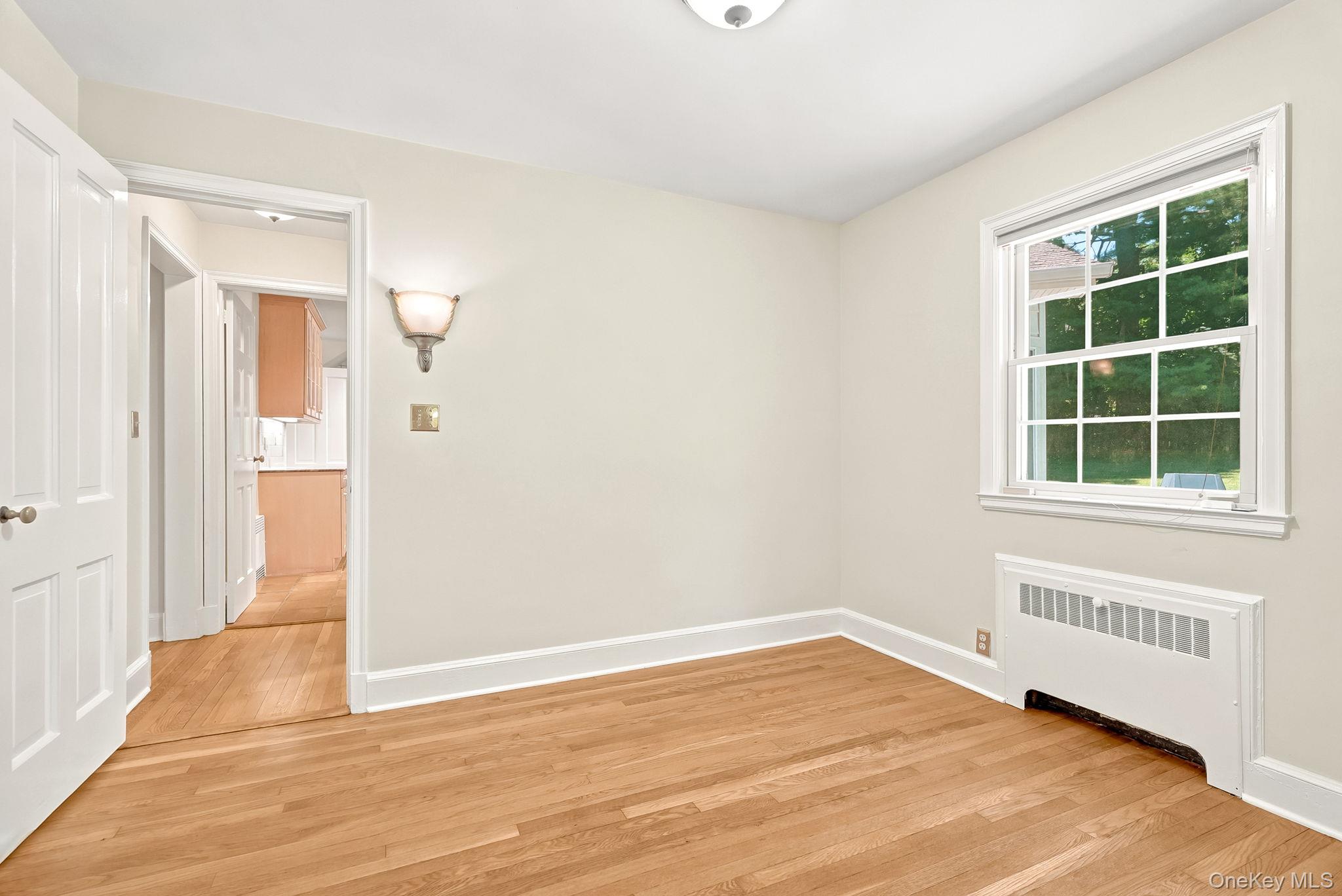 1 Sheridan Road Scarsdale, NY 10583 - Photo 18 of 40 Additional view of first floor bedroom/den showing closet door on left