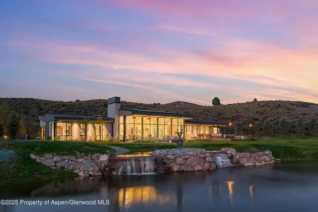 a view of a lake with a big yard