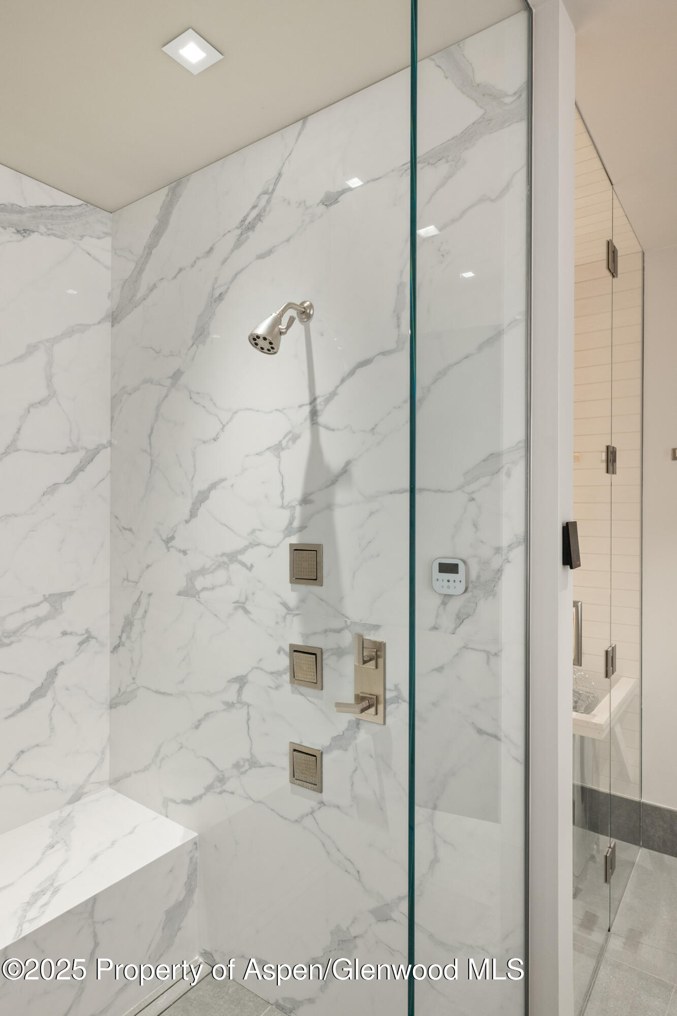 6890 East Sopris Creek Road Snowmass, CO 81654 - Photo 26 of 40 a bathroom with a shower and a sink