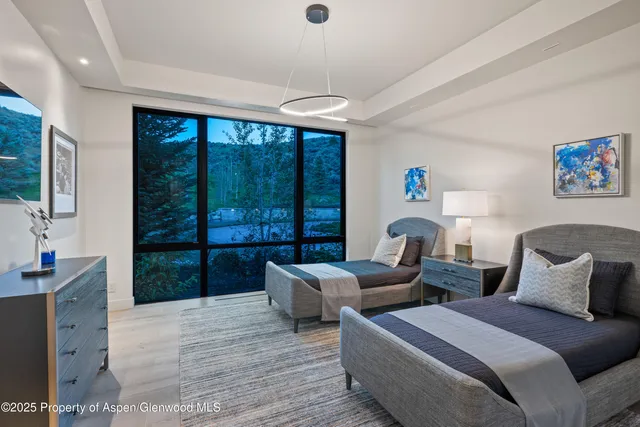 a bathroom with a sink a mirror and a bathtub