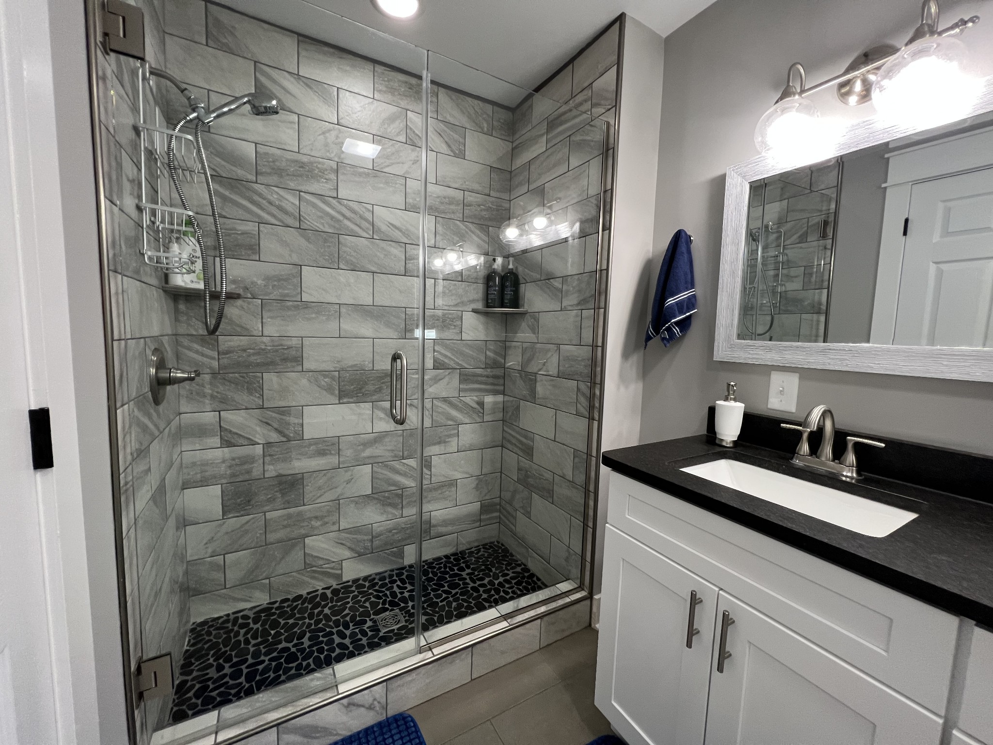 1951 Oak Grove Road Red Boiling Springs, TN 37150 - Photo 34 of 60 a bathroom with a shower and a sink