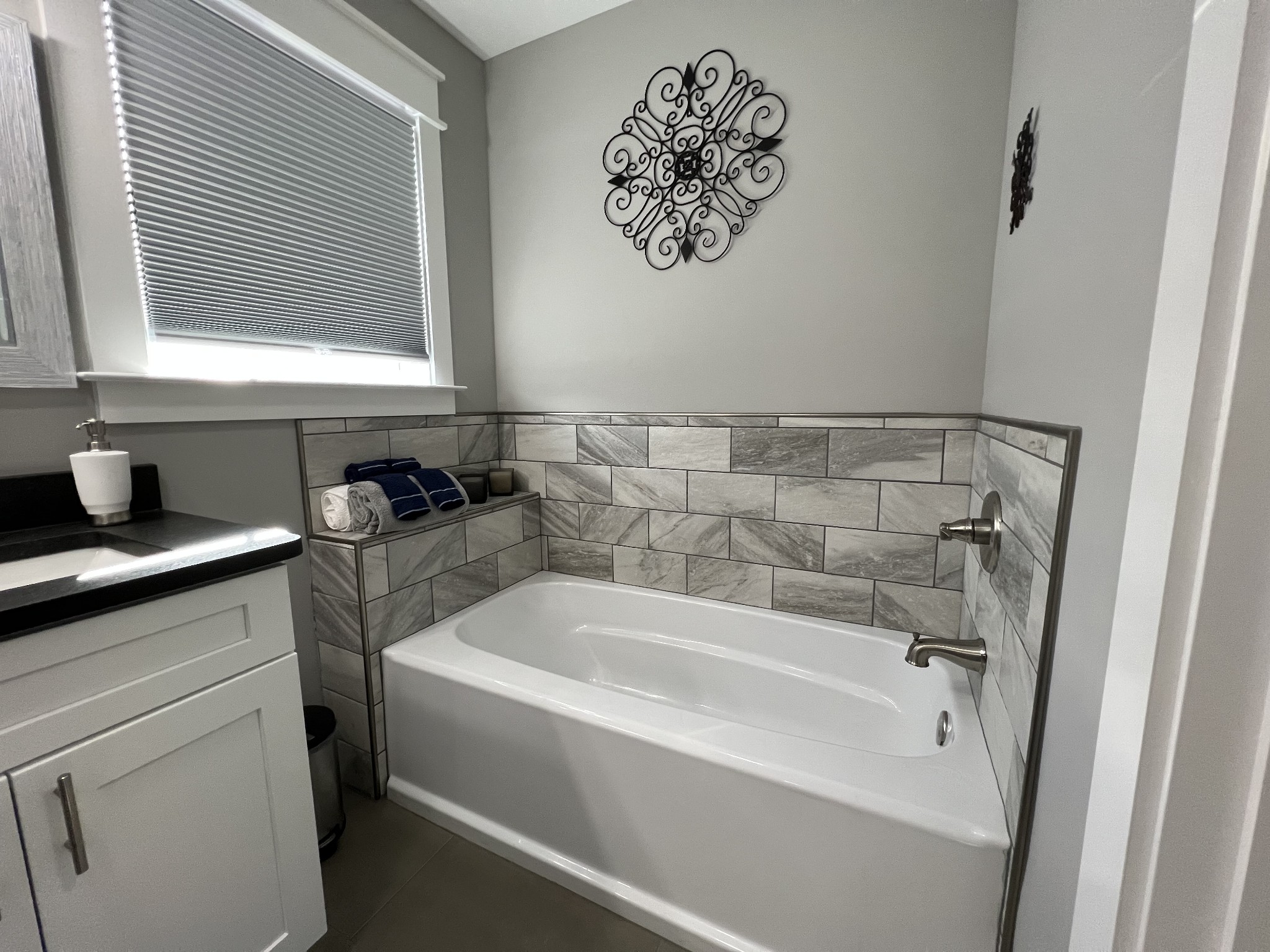 1951 Oak Grove Road Red Boiling Springs, TN 37150 - Photo 38 of 60 a bathroom with a bathtub and a sink