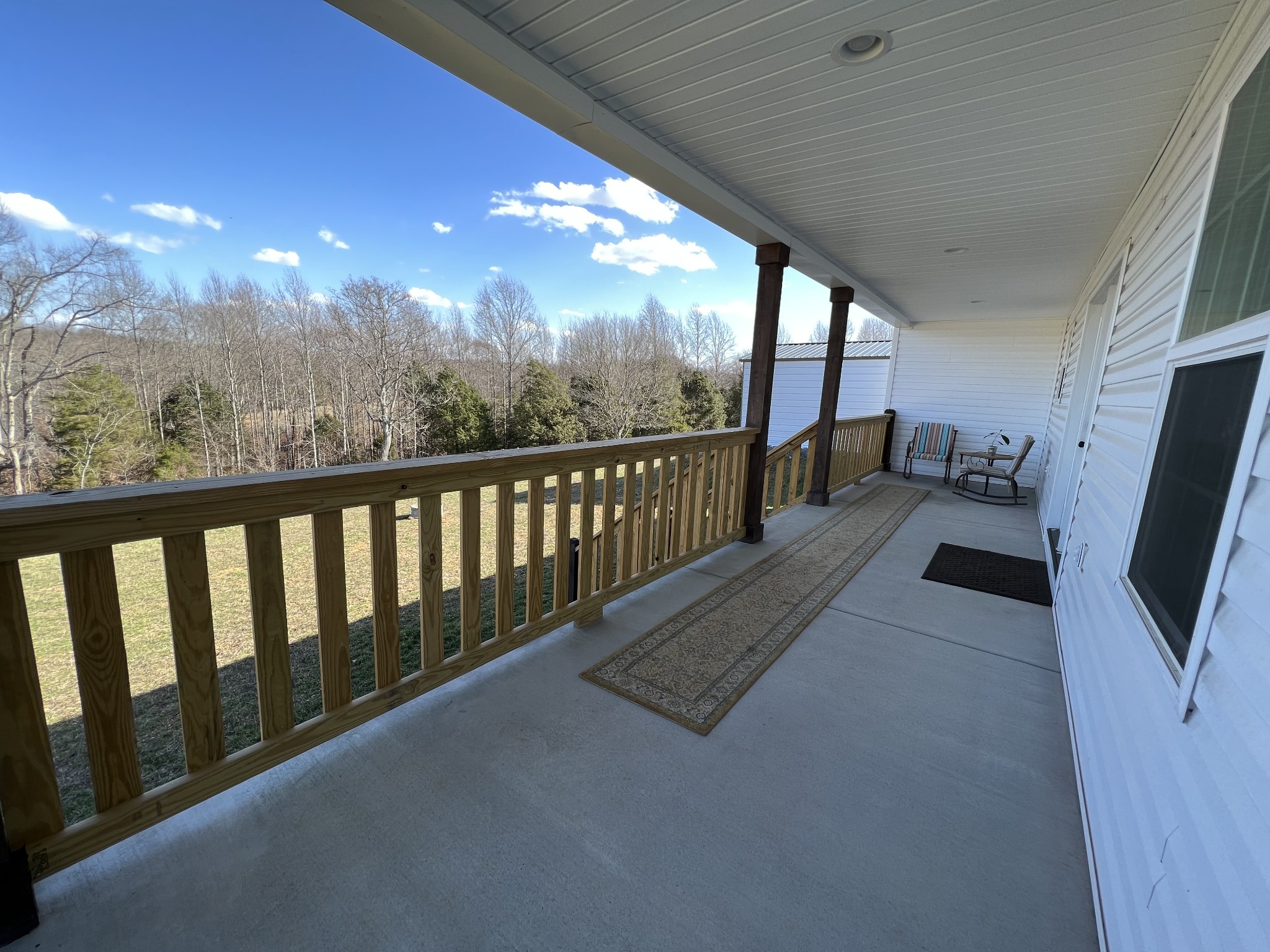1951 Oak Grove Road Red Boiling Springs, TN 37150 - Photo 45 of 60 a view of two chairs in the balcony
