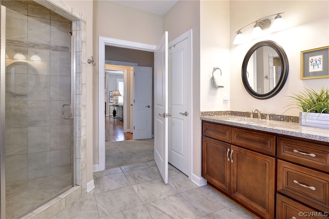 232 Beeston Fields Williamsburg, VA 23188 - Photo 19 of 39 a bathroom with a sink and a mirror