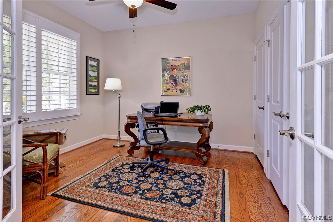 232 Beeston Fields Williamsburg, VA 23188 - Photo 24 of 39 a workspace with wooden floor and a rug