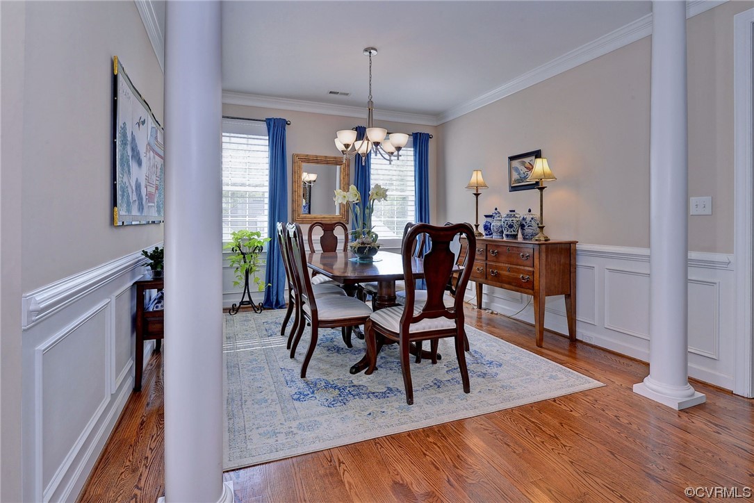232 Beeston Fields Williamsburg, VA 23188 - Photo 6 of 39 a view of a dining room with furniture window and wooden floor