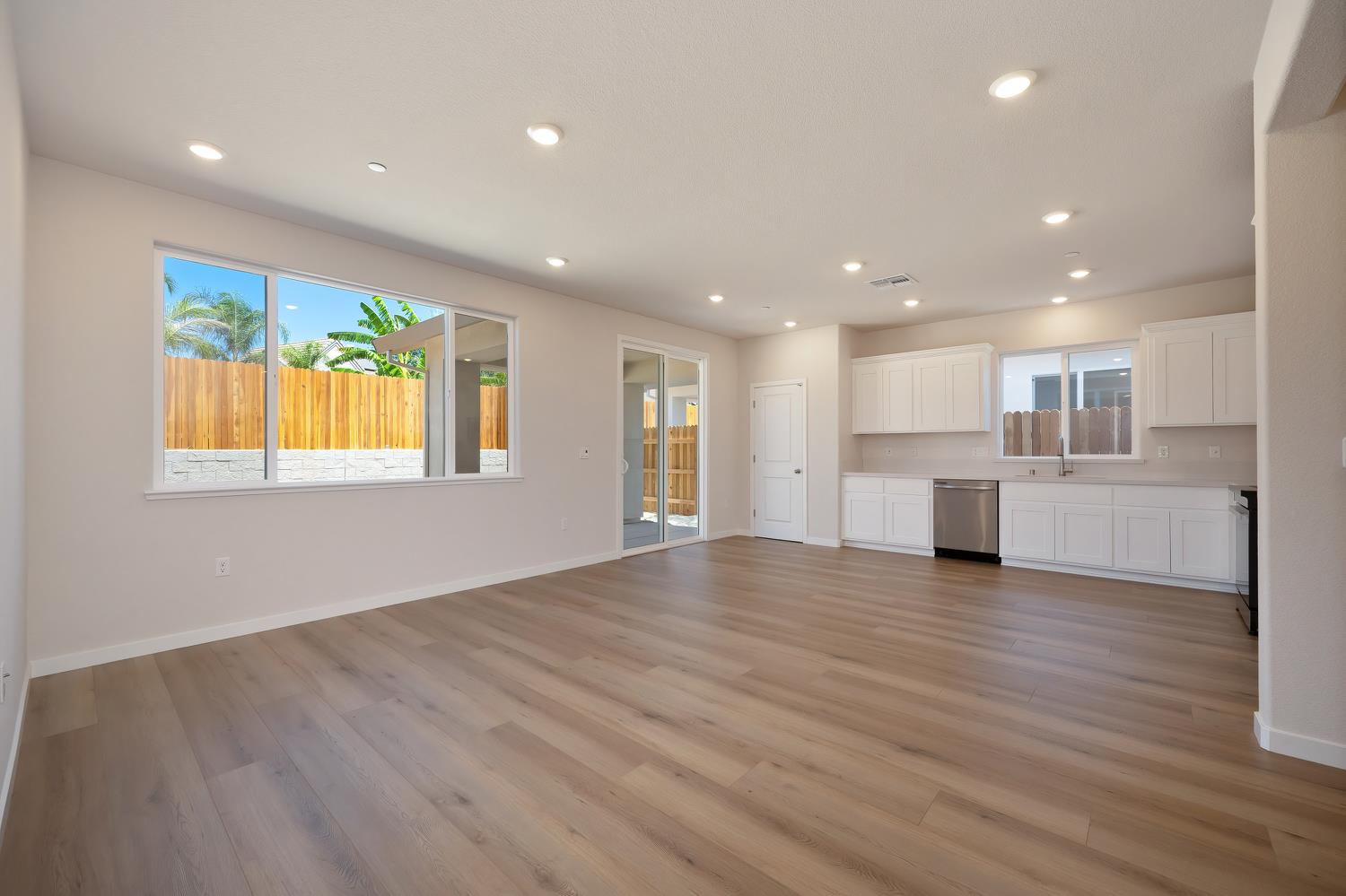 1089 Mallory Ridge Street Roseville, CA 95747 - Photo 10 of 36 a view of kitchen with wooden floor and windows