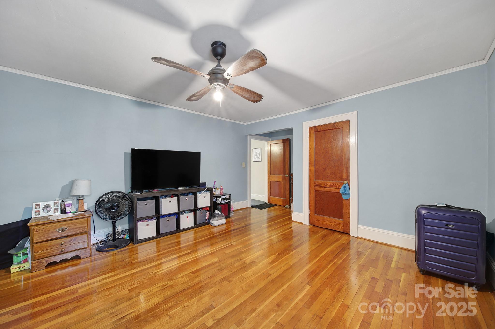 504 Chesterfield Avenue Lancaster, SC 29720 - Photo 14 of 24 a living room with furniture and a flat screen tv