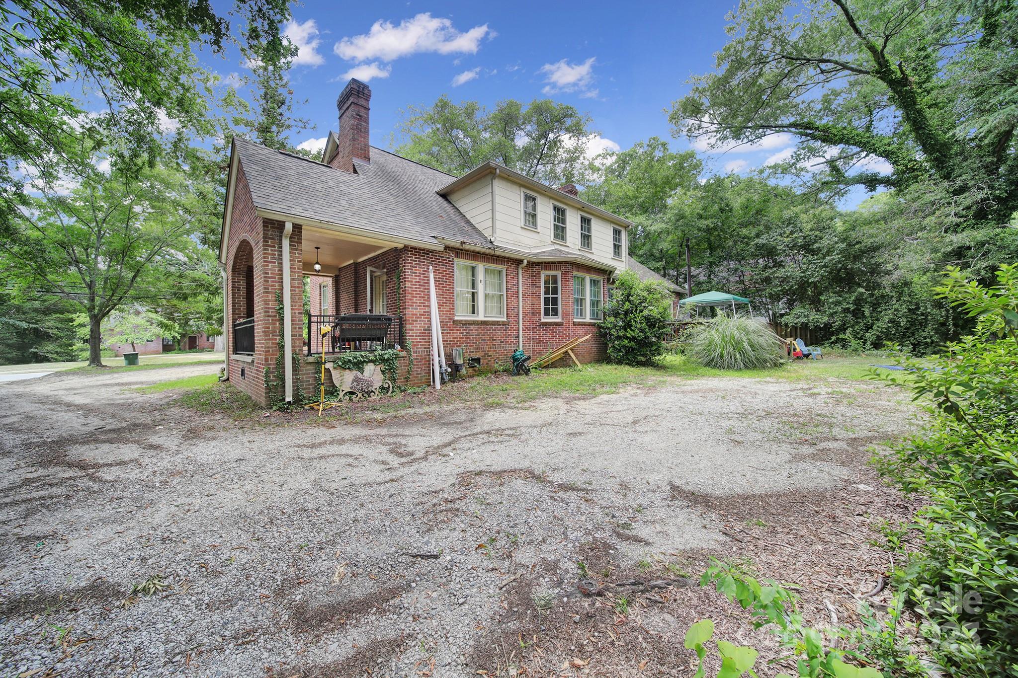 504 Chesterfield Avenue Lancaster, SC 29720 - Photo 21 of 24 a view of a house with a yard and tree s