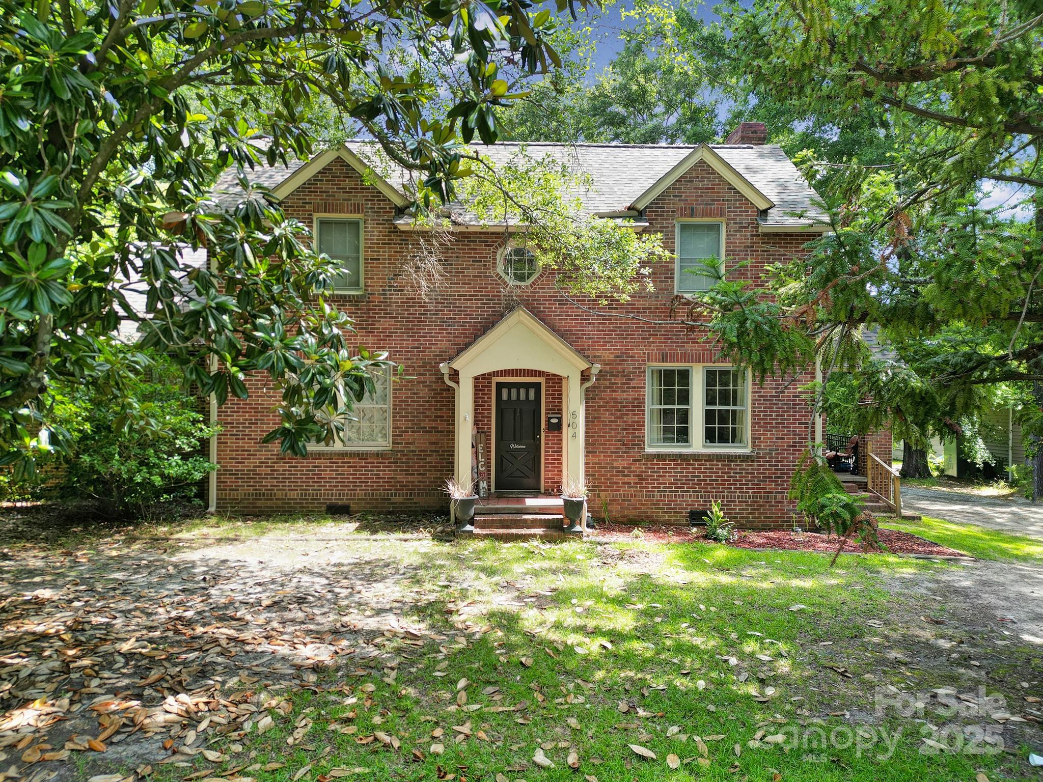 504 Chesterfield Avenue Lancaster, SC 29720 - Photo 24 of 24 a front view of a house with a yard and garage