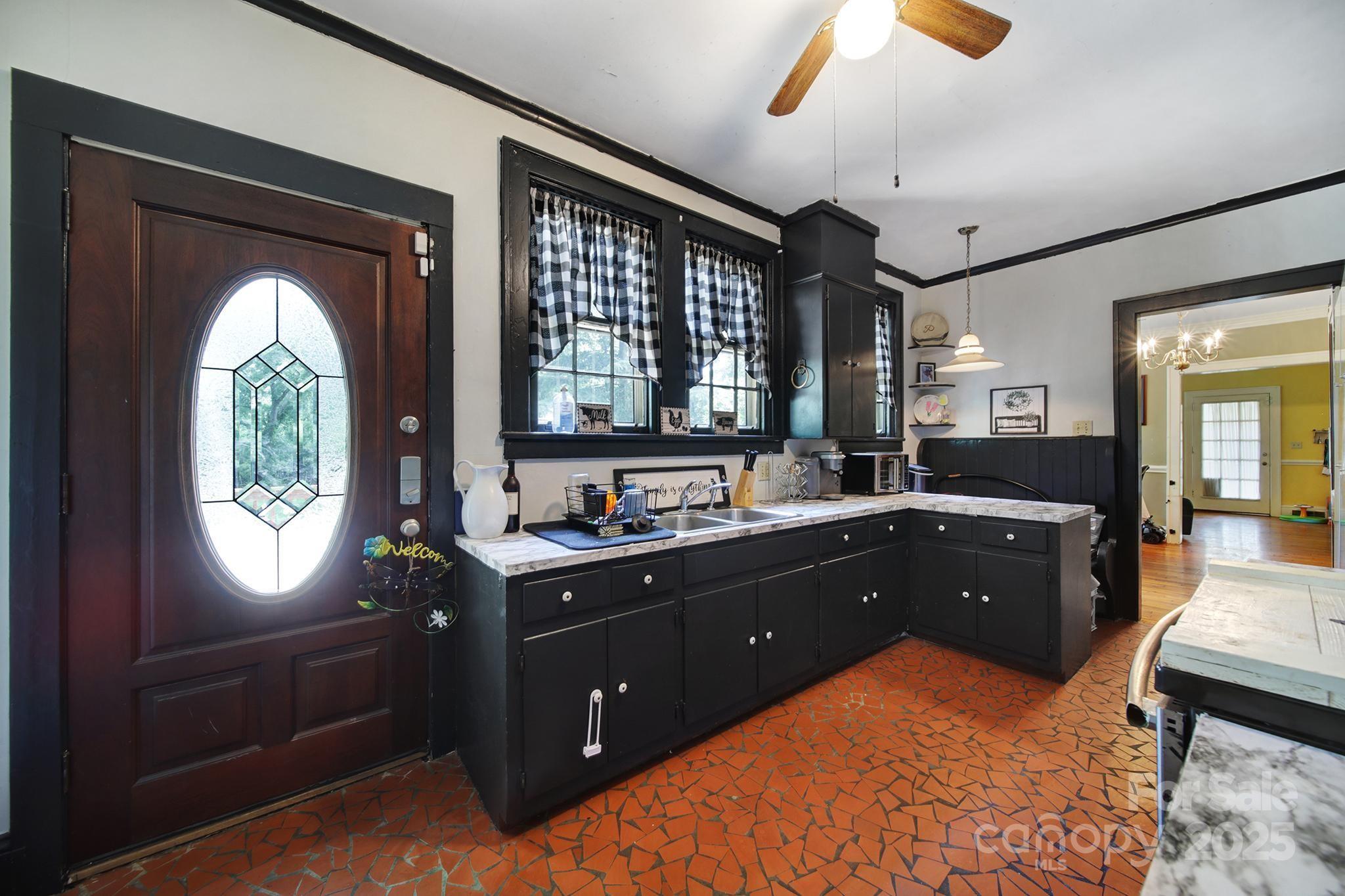 504 Chesterfield Avenue Lancaster, SC 29720 - Photo 10 of 24 a spacious bathroom with a vanity and a mirror
