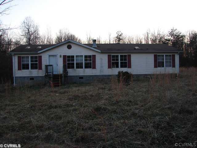 152 Pamplin Road Victoria, VA 23974 - Photo 1 of 1 a front view of a house with yard