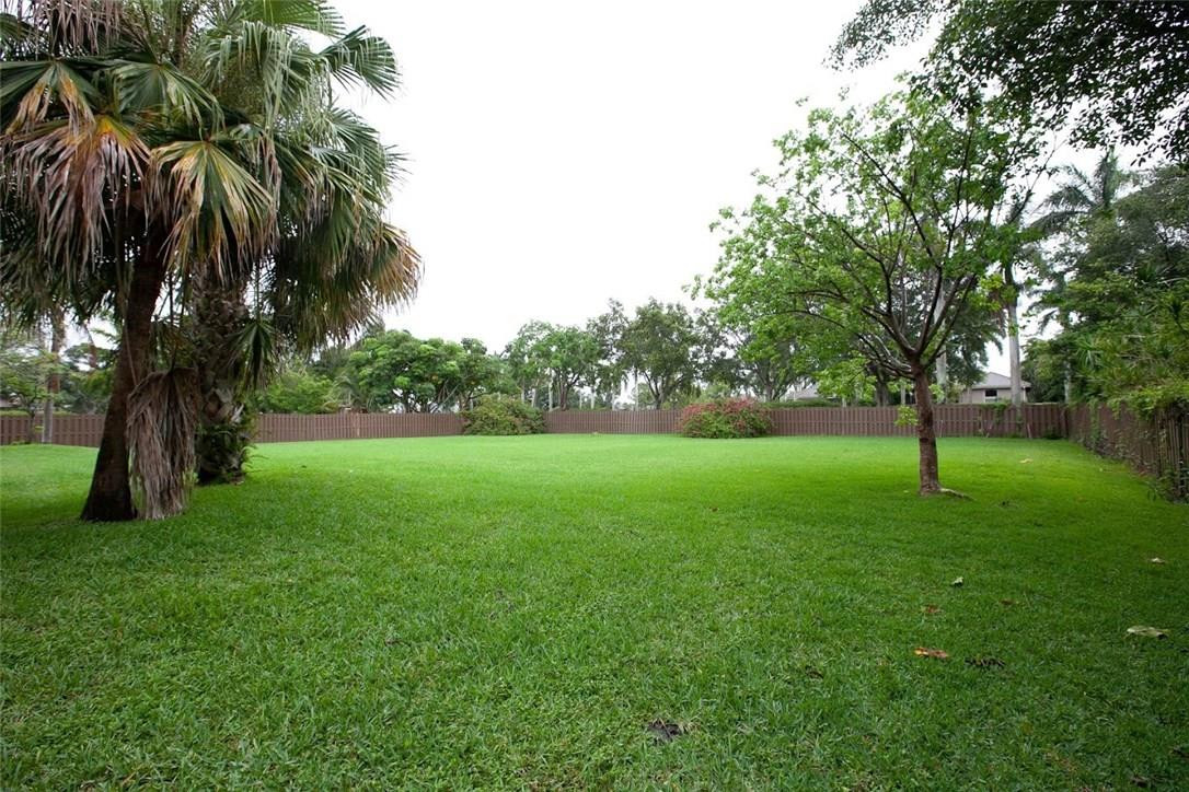 21836 Reflection Lane Boca Raton, FL 33428 - Photo 54 of 58 a view of a yard with a tree