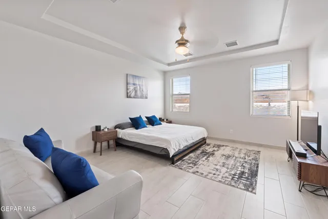 a bedroom with furniture and a couch