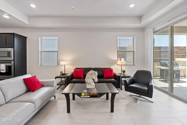 a living room with furniture and a window