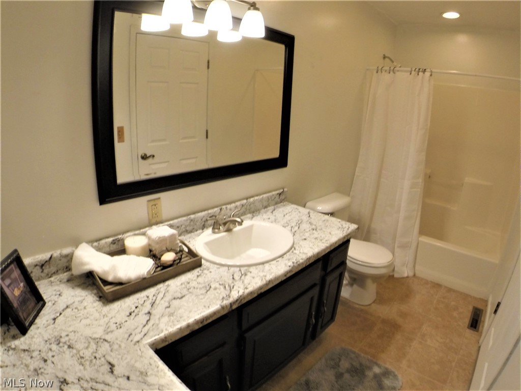 55101 Iowa Road Cumberland, OH 43732 - Photo 20 of 30 Master bathroom offers plenty of space and lots of counter top area and cabinets/drawers beneath.